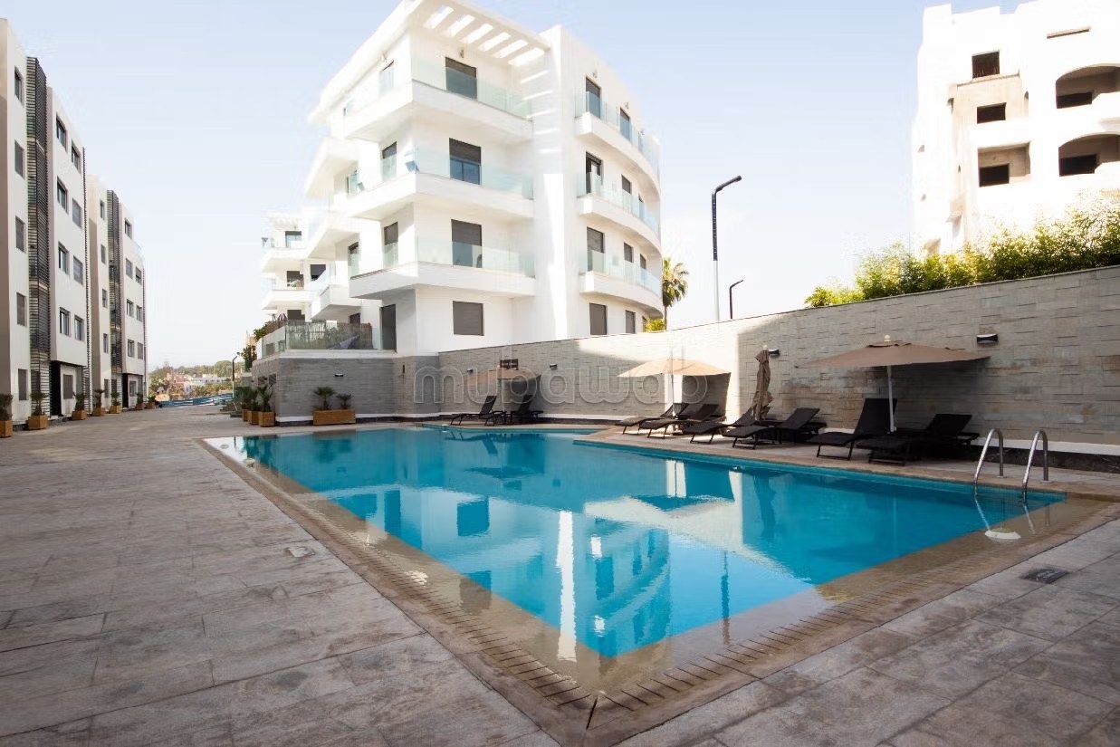 Appartement à louer courte durée à Agadir bay secteur touristique 
deux chambre salon cuisine équipée superficie 75 mètres carrés piscine à 300 mètres de la plage - Photo 4