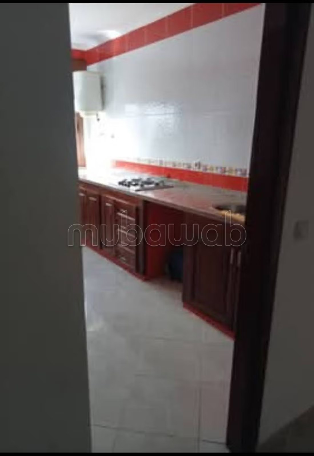 Location d'un appartement à M'Diq. 
Superficie 68 m². 
Salon traditionnel et système d'antenne parabolique - Photo 8