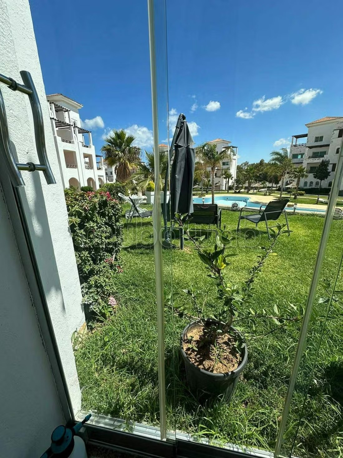 Location saisonnière à Cabo Negro. 2 belles chambres. Terrasse et jardin - Photo 6