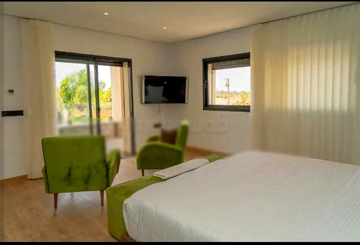 Magnifique villa à louer pour vos vacances à Route de Ouarzazate. 7 pièces. Résidence avec concierge, climatisation générale - Photo 30