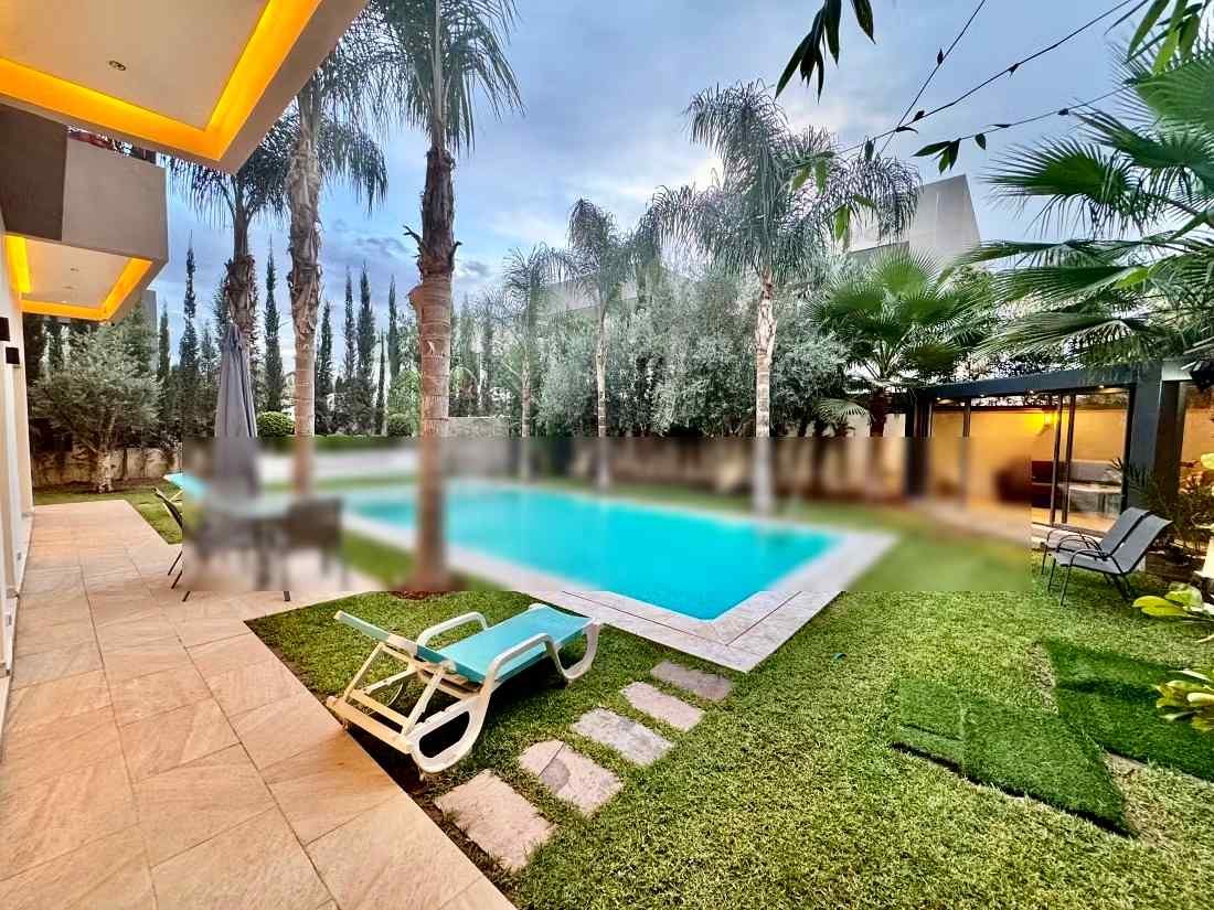 Belle villa à louer pour vos vacances à Route de Tahanaout, 8 grandes pièces dont 2 suites et 1 chambre. Parking et terrasse - Photo 4