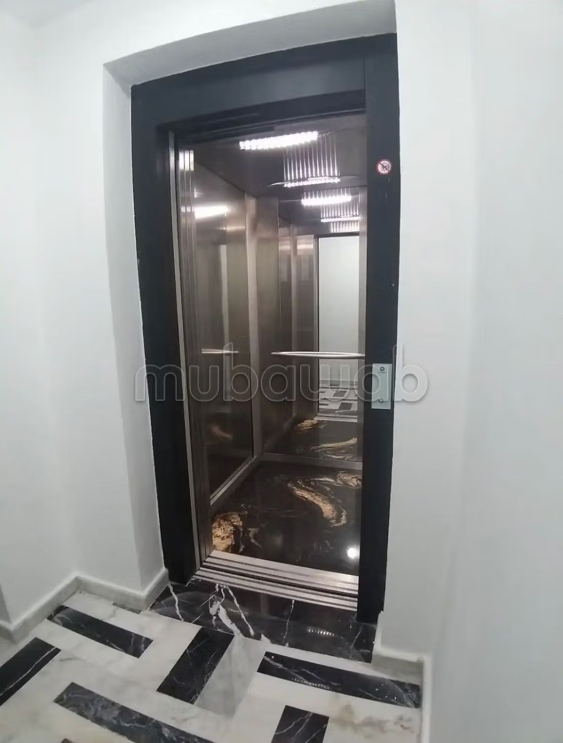 Location d'un appartement à fermme bretonne. Surface totale 45 m². Terrasse et ascenseur